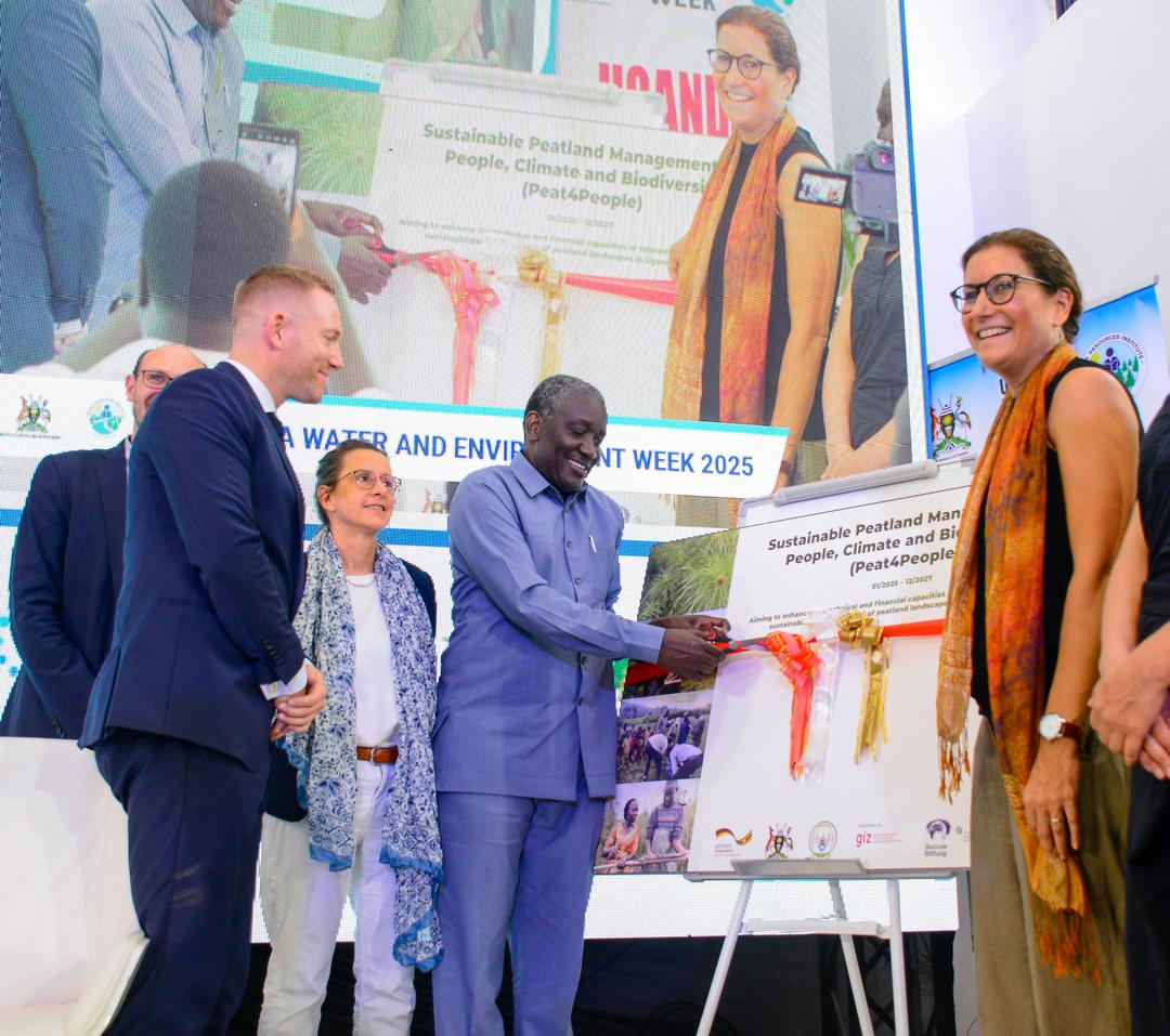 The Permanent Secretary of the Ministry of Water and Environment, Dr. Alfred Okot Okidi, launches the Sustainable Peatland Management for People, Climate, and Biodiversity (Peat4People) project. From left to right, Mr. Jan Peters, Managing Director Michal Succow Foundation, Mr. Philippe Roussel, Deputy Head of Development Cooperation at the German Embassy in Kampala, Claudia Mayer, Head of Section, Environmental Policies, Biodiversity, Forests, GIZ and Myriam Fernando, GIZ Uganda Head of Rural Development Programmes and Ms Leila Shamsaifar, the Programme Development Specialist, FAO.